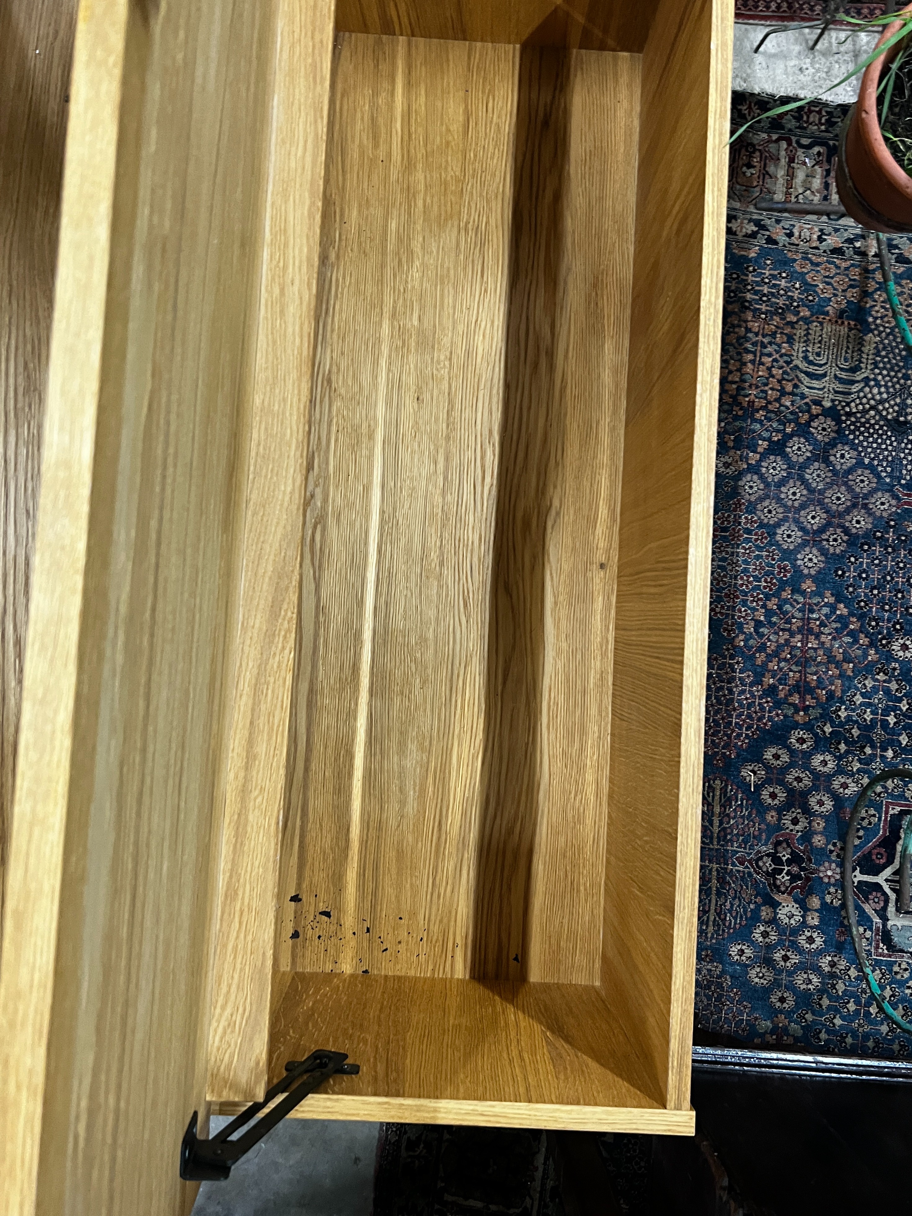 A contemporary Laura Ashley Garrat oak hinged top 12 drawer storage coffee table, length 118cm, depth 66cm, height 44cm